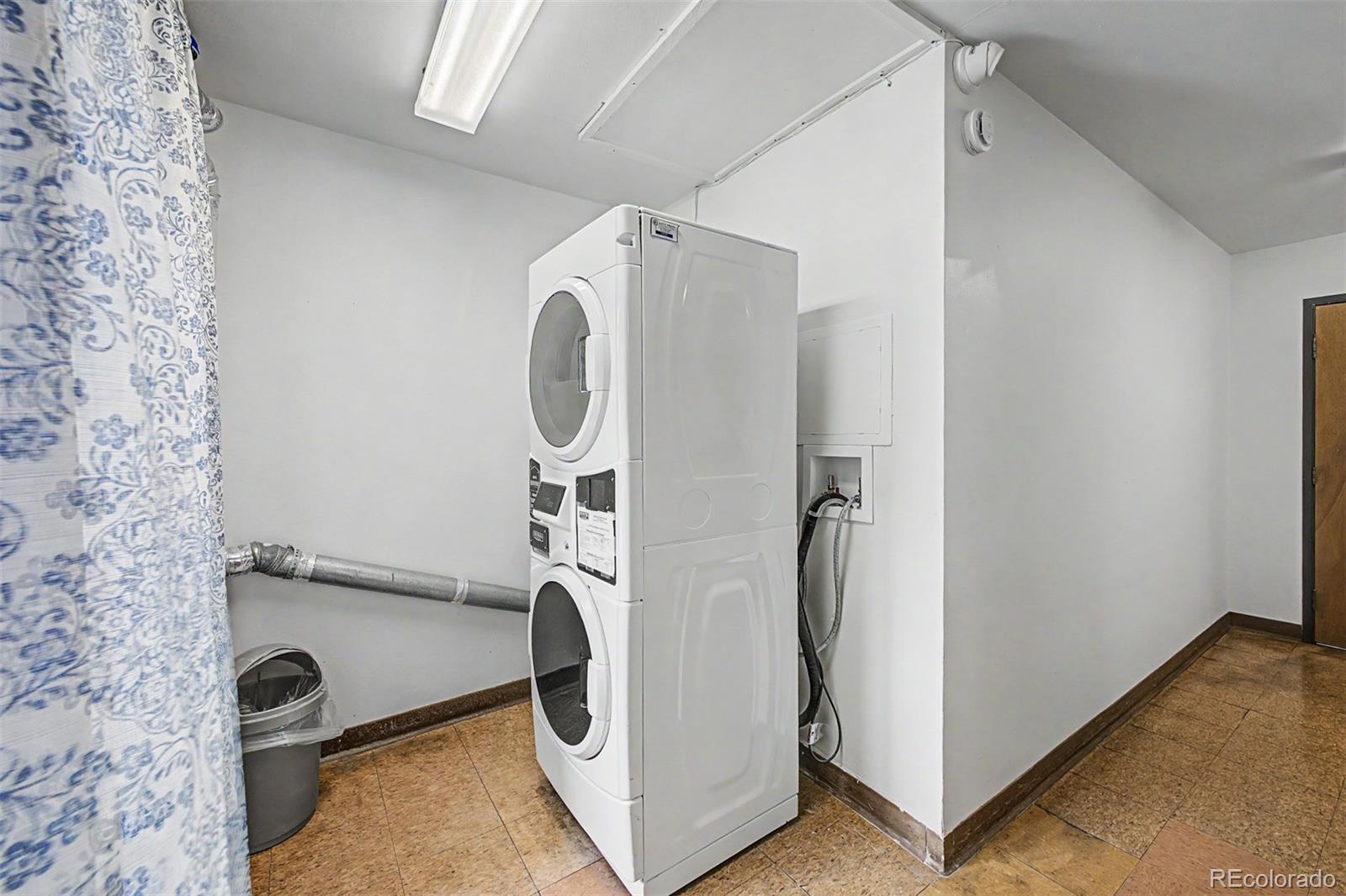 31270 John Wallace Road, Unit 412 Evergreen, CO 80439 - Photo 29 of 38 a view of a storage & utility room with a washer dryer