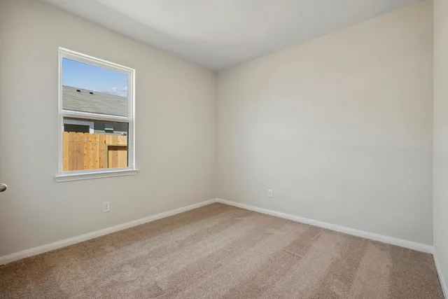 an empty room with a window