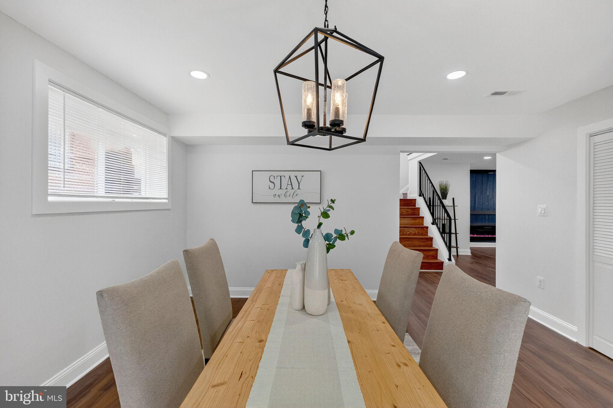 3240 Pope Street Southeast Washington, DC 20020 - Photo 12 of 38 a view of a livingroom with furniture and wooden floor