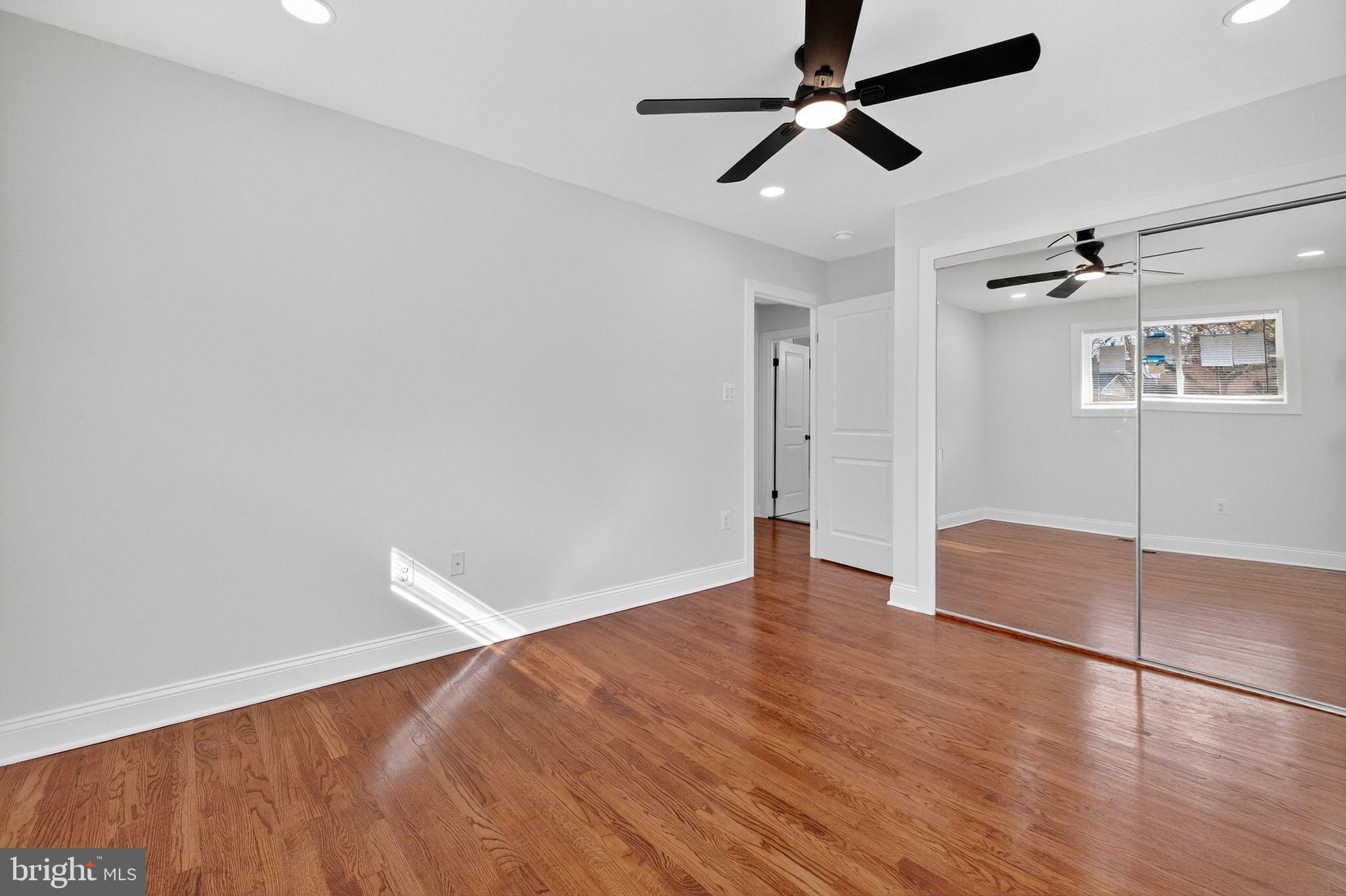 3240 Pope Street Southeast Washington, DC 20020 - Photo 21 of 38 a view of empty room with wooden floor