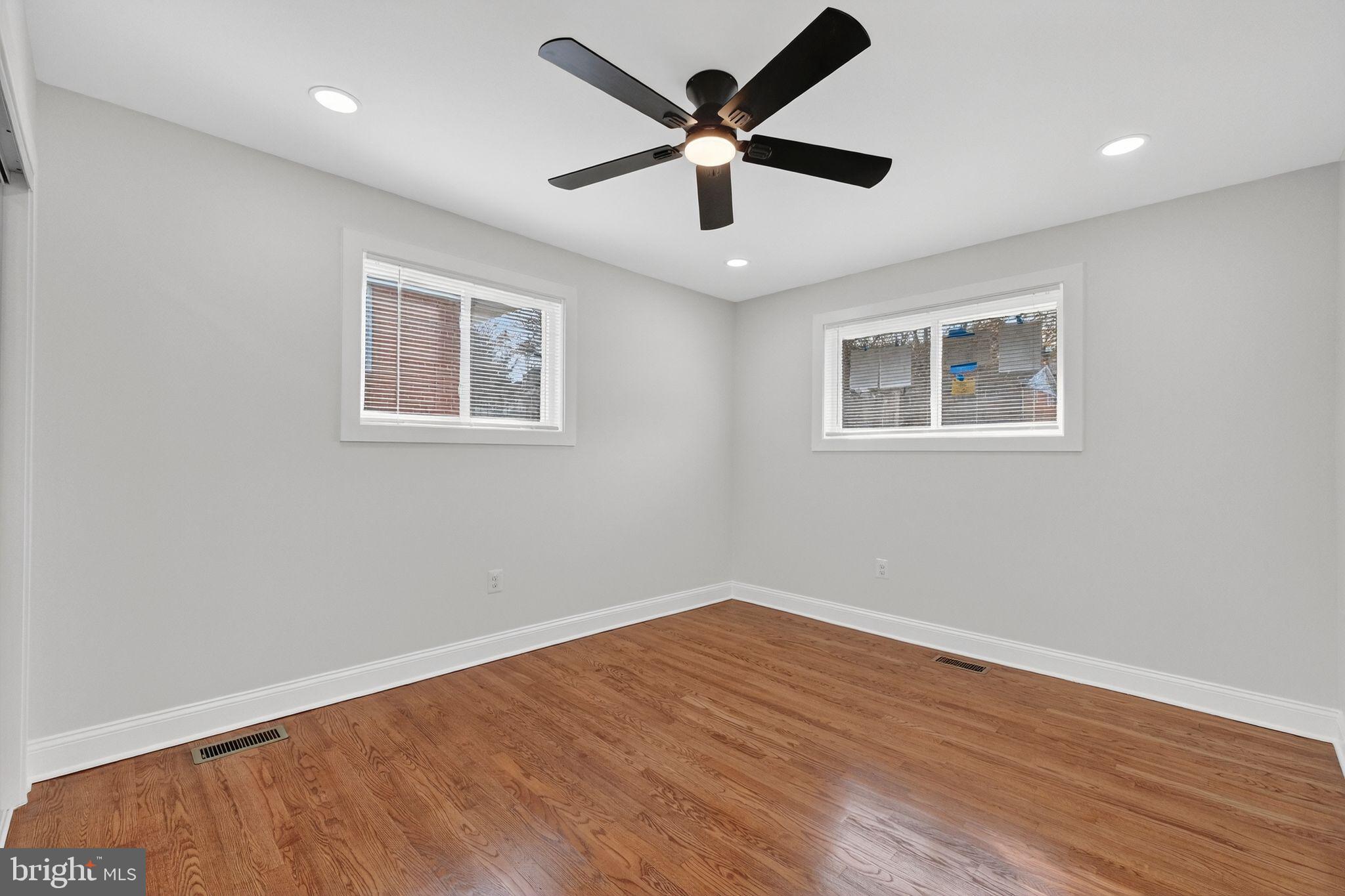 3240 Pope Street Southeast Washington, DC 20020 - Photo 22 of 38 a view of empty room with wooden floor