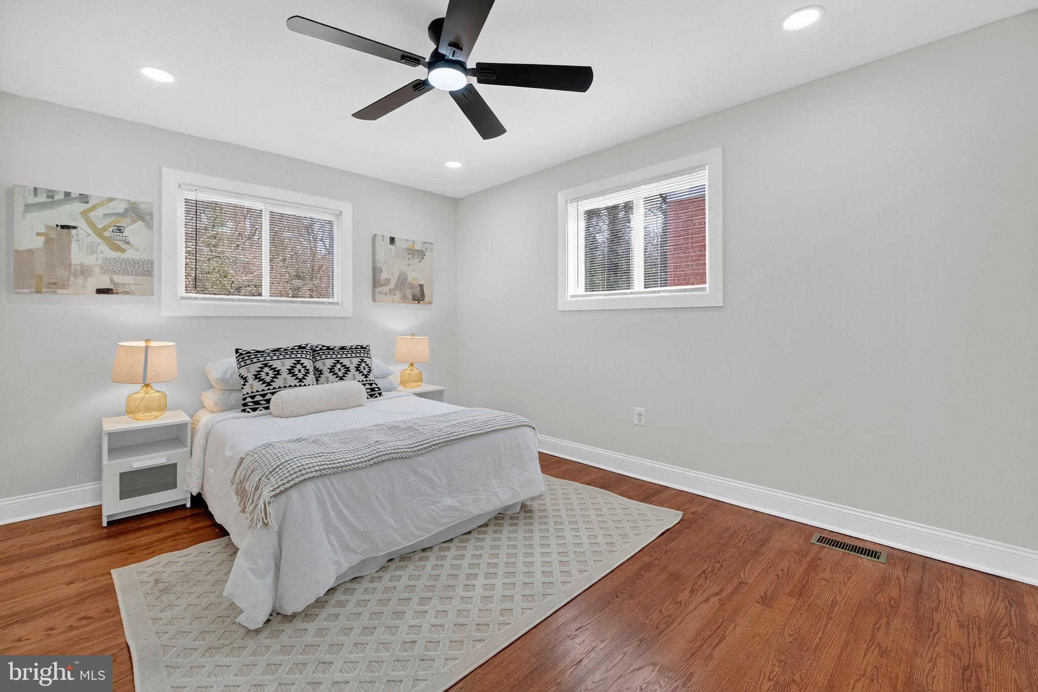 3240 Pope Street Southeast Washington, DC 20020 - Photo 24 of 40 a bedroom with a large bed and a window