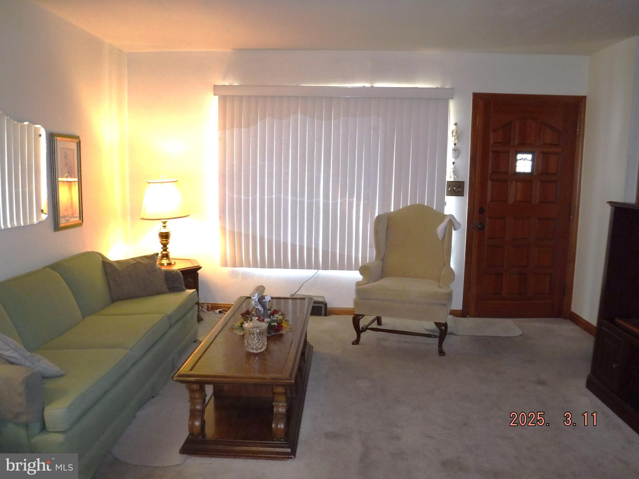 2015 Wareham Road Baltimore, MD 21222 - Photo 14 of 54 a living room with furniture and a window