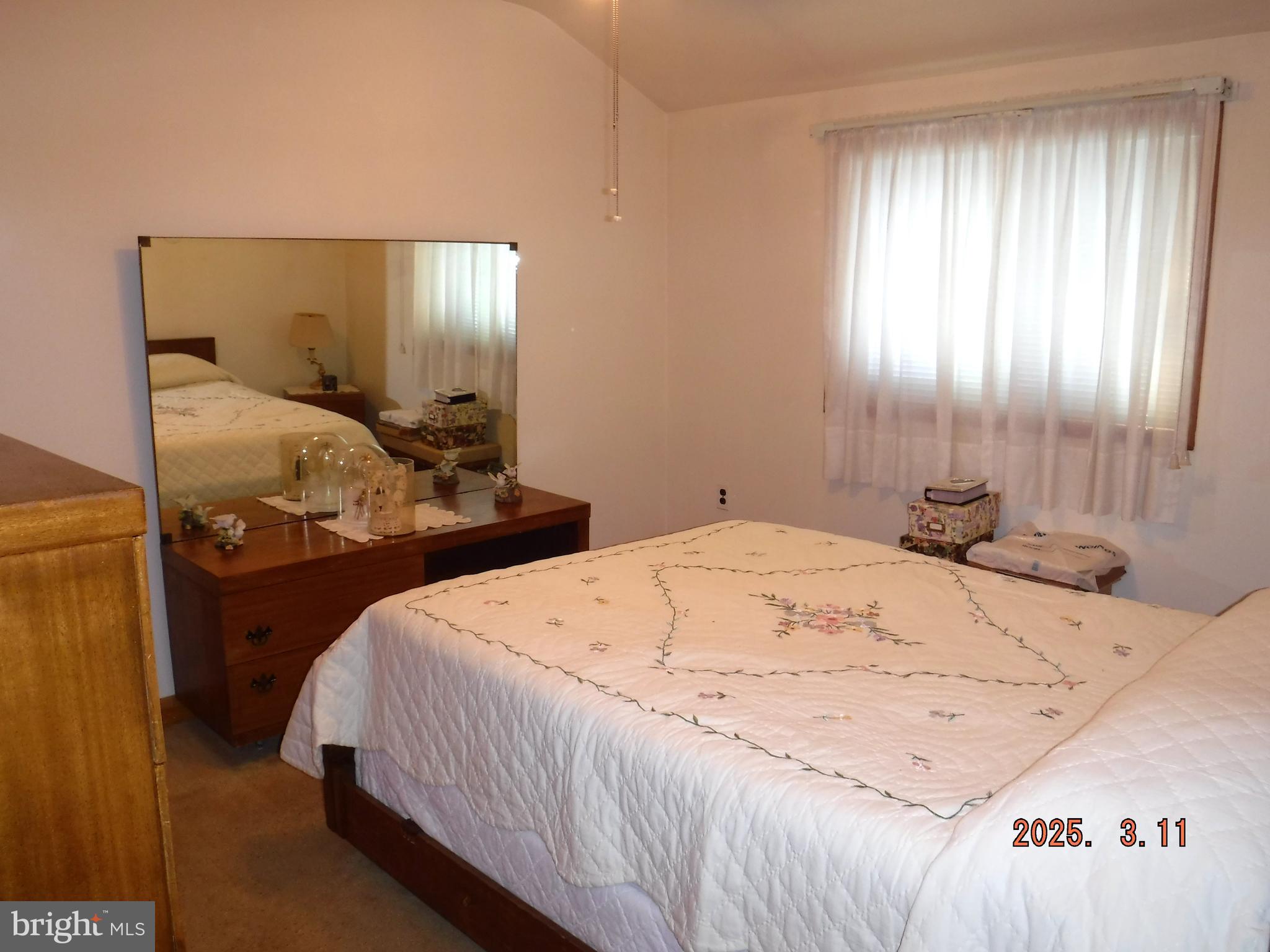 2015 Wareham Road Baltimore, MD 21222 - Photo 16 of 54 a bedroom with a bed and window