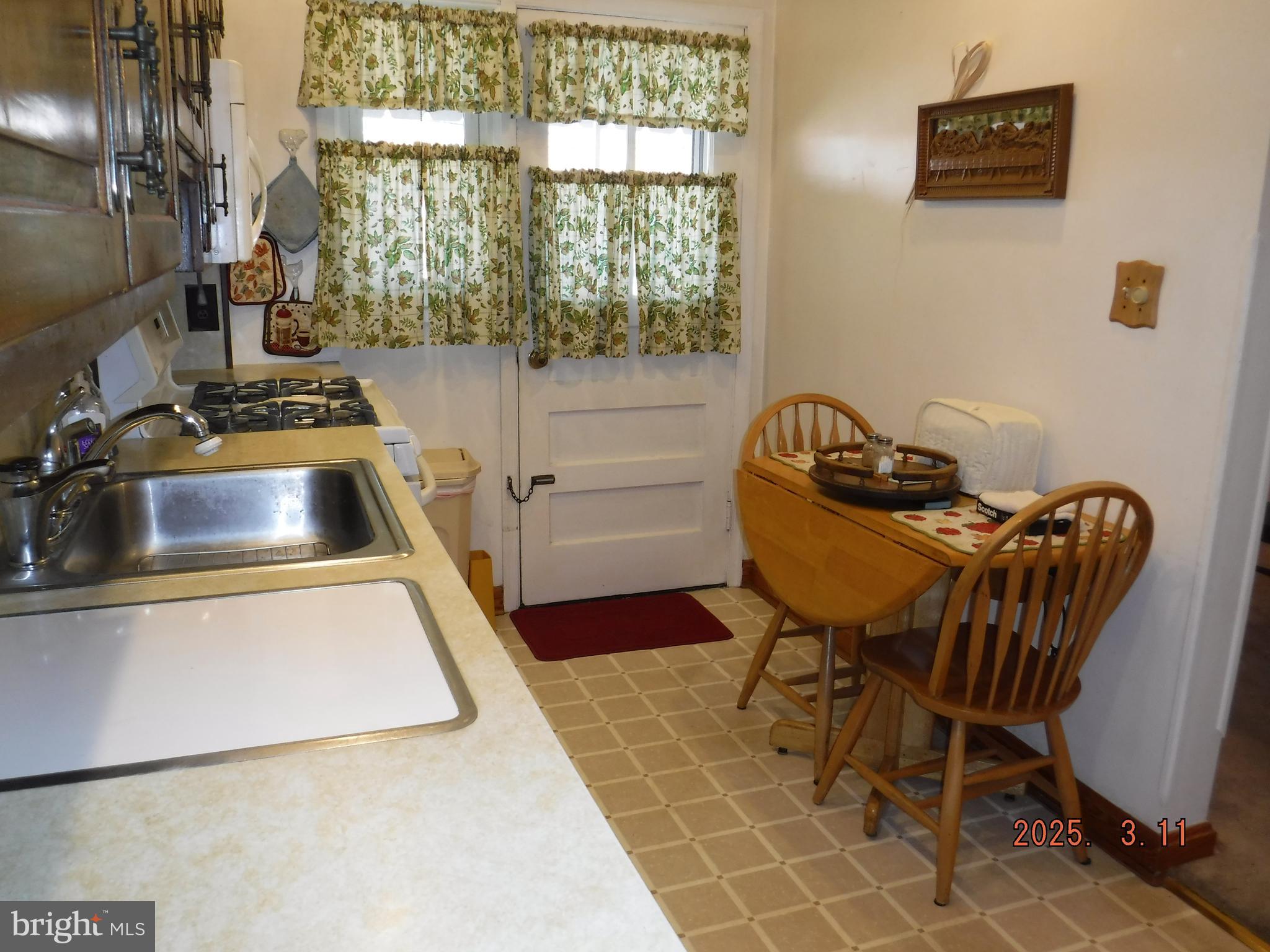 2015 Wareham Road Baltimore, MD 21222 - Photo 7 of 54 a view of a workspace with furniture and a window