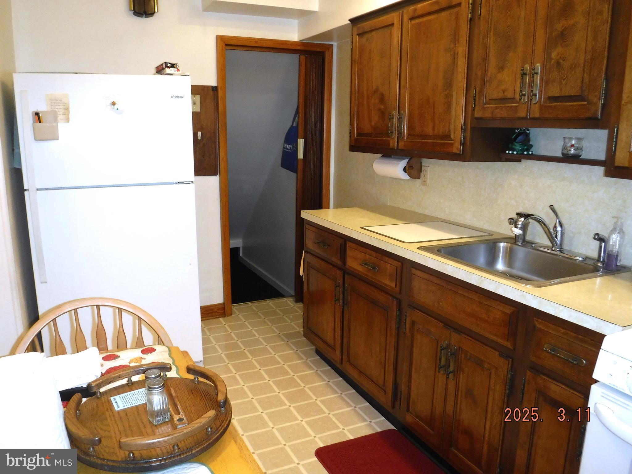 2015 Wareham Road Baltimore, MD 21222 - Photo 8 of 54 a kitchen with a refrigerator and a sink