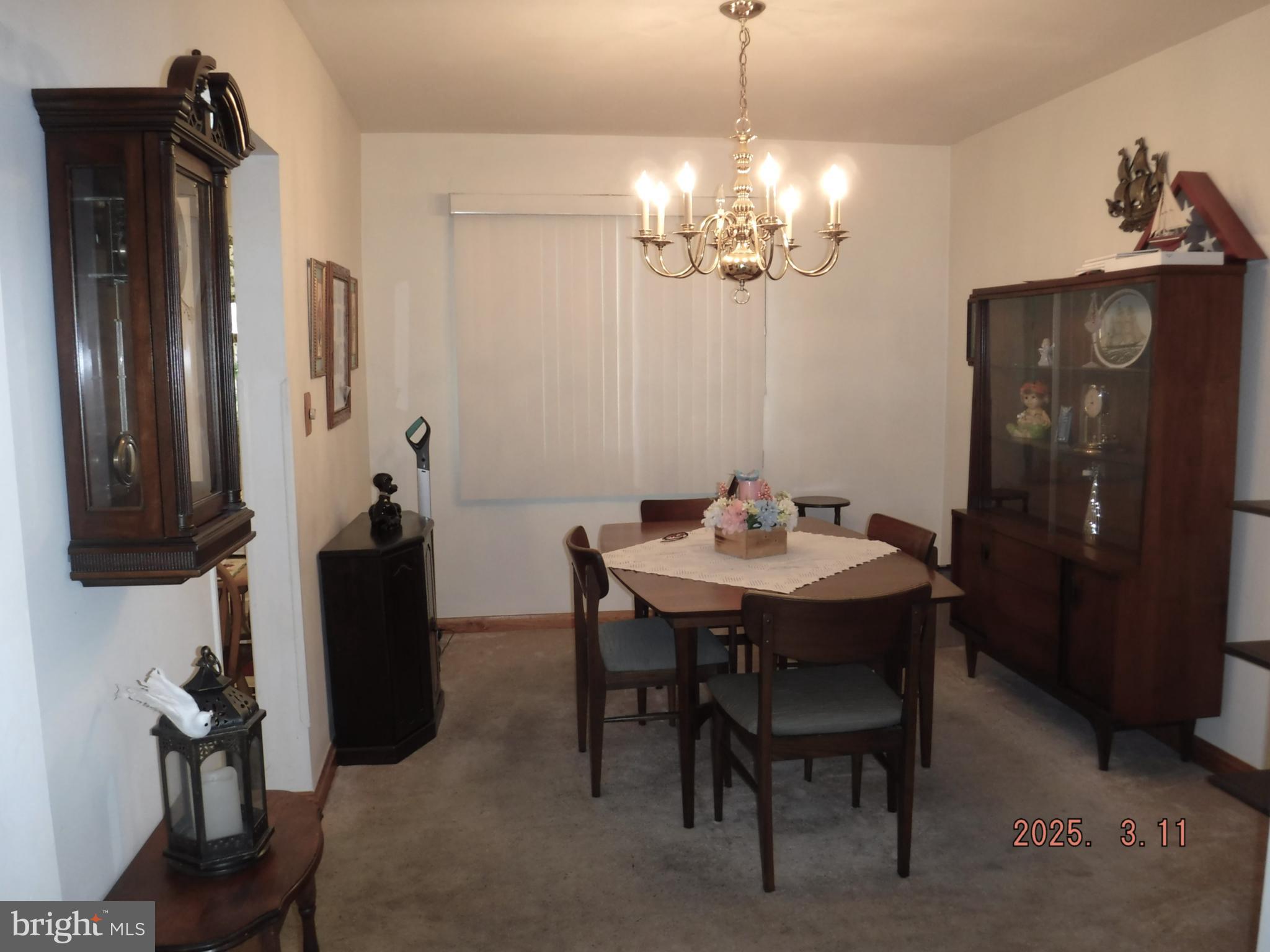 2015 Wareham Road Baltimore, MD 21222 - Photo 9 of 54 a view of a dining room with furniture and chandelier