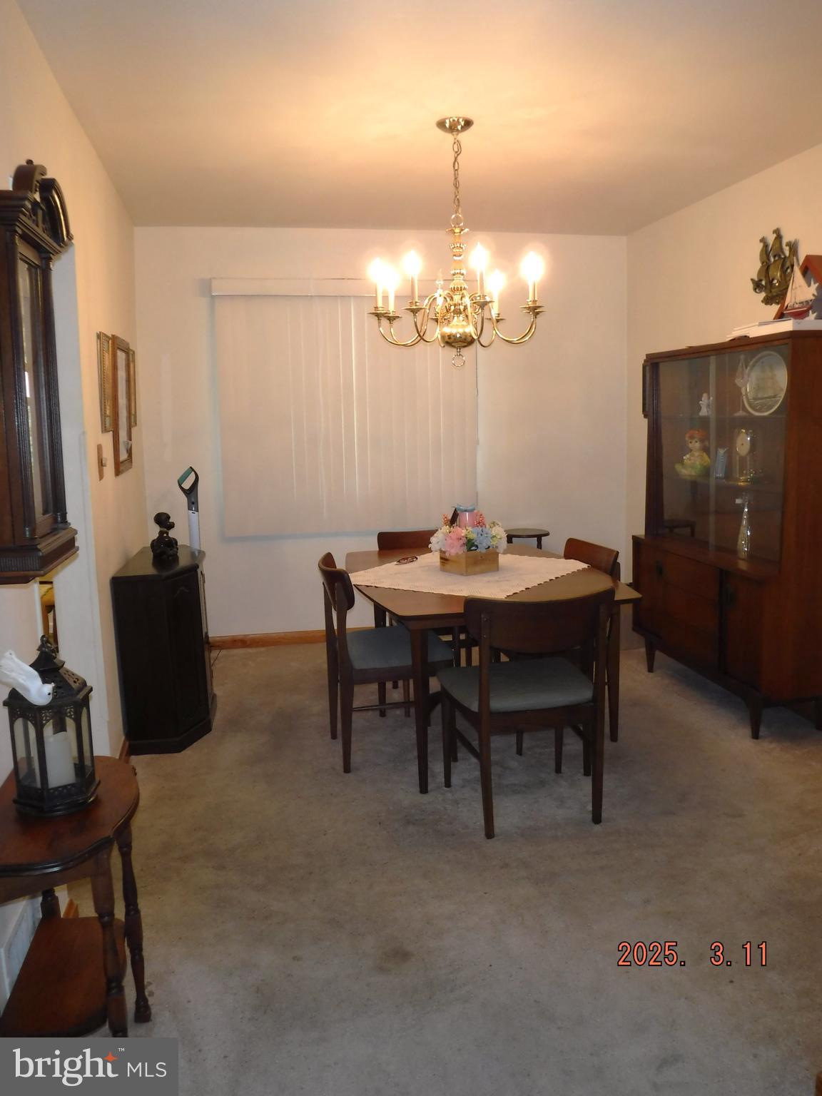 2015 Wareham Road Baltimore, MD 21222 - Photo 10 of 54 a dining room with furniture a chandelier and window