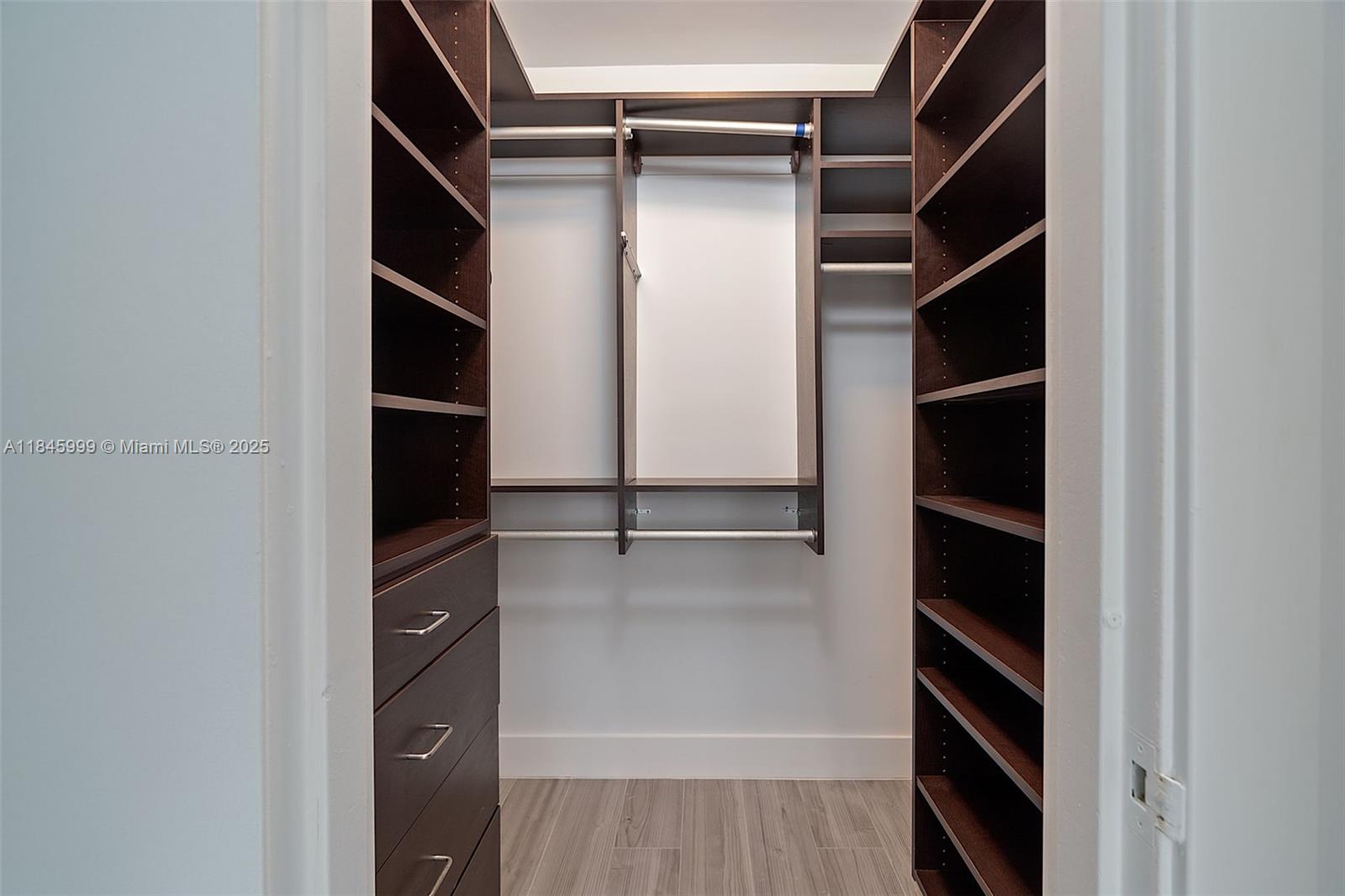1200 West Avenue, Unit 521 Miami Beach, FL 33139 - Photo 19 of 51 a view of walk in closet with empty racks