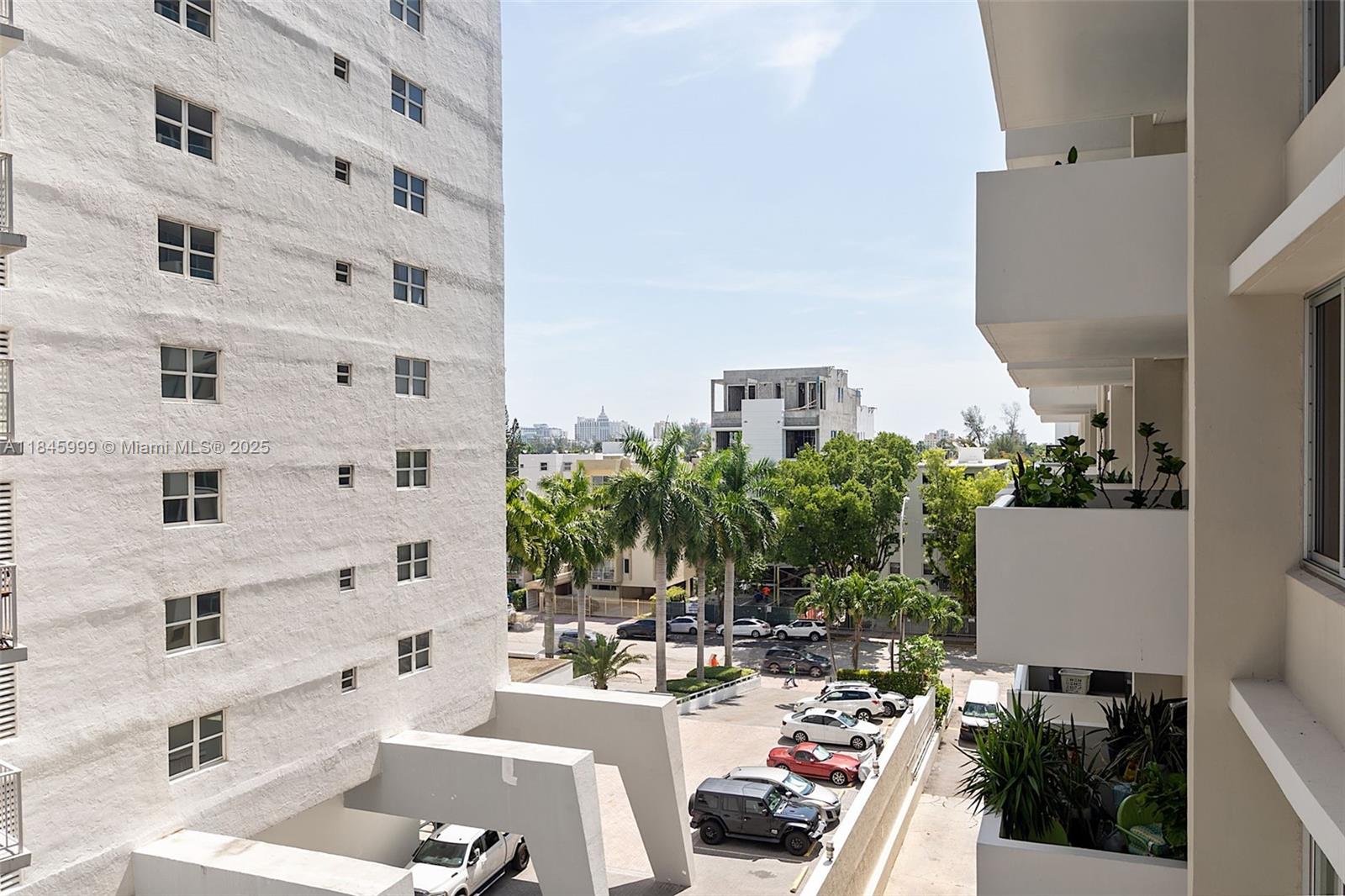 1200 West Avenue, Unit 521 Miami Beach, FL 33139 - Photo 21 of 51 a view of a tall building in the backyard