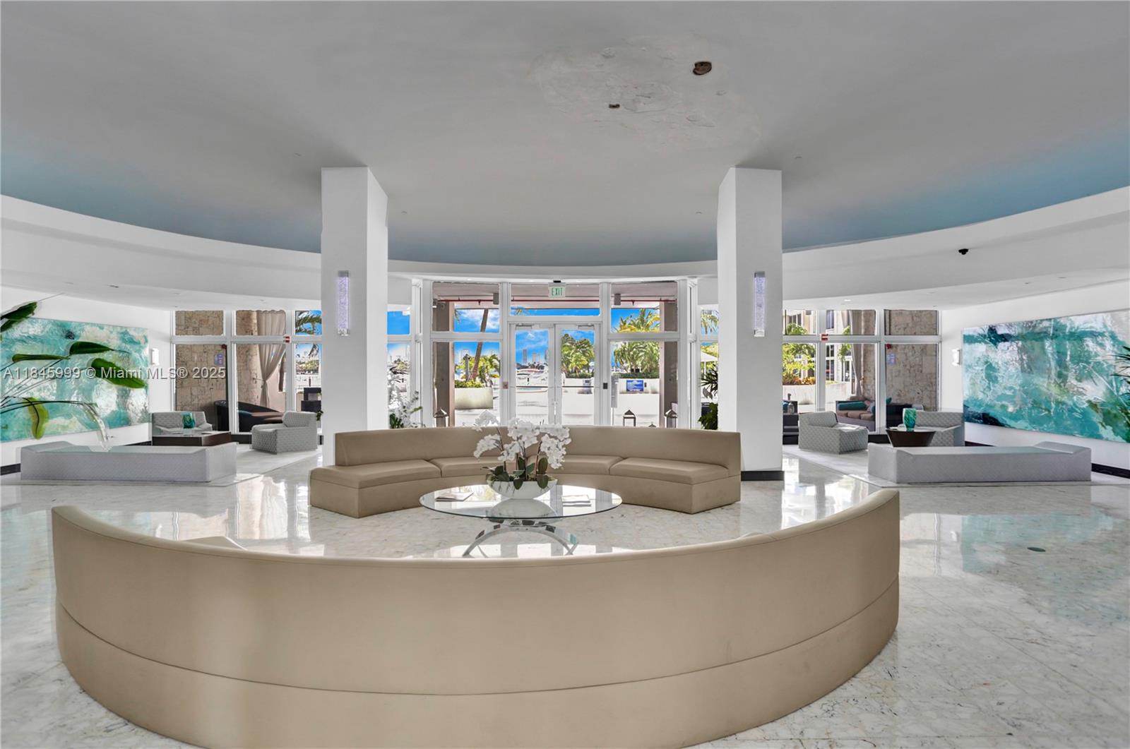 1200 West Avenue, Unit 521 Miami Beach, FL 33139 - Photo 30 of 51 a dining room with couch and a large window