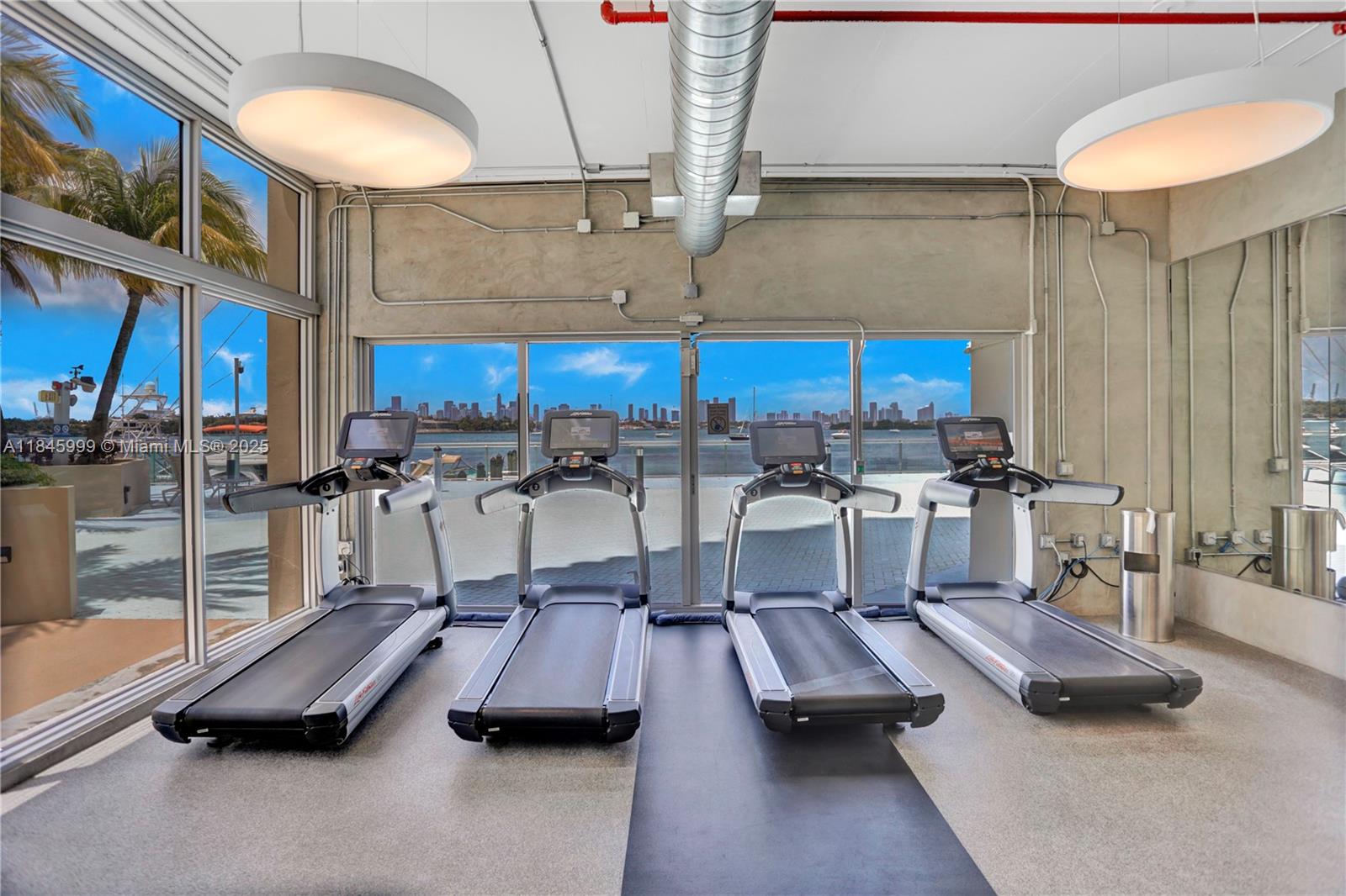 1200 West Avenue, Unit 521 Miami Beach, FL 33139 - Photo 36 of 51 a room with gym equipment