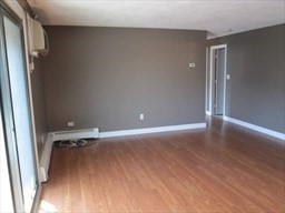 40 Colonial Drive, Unit 8 Andover, MA 01810 - Photo 8 of 19 a view of a room with wooden floor