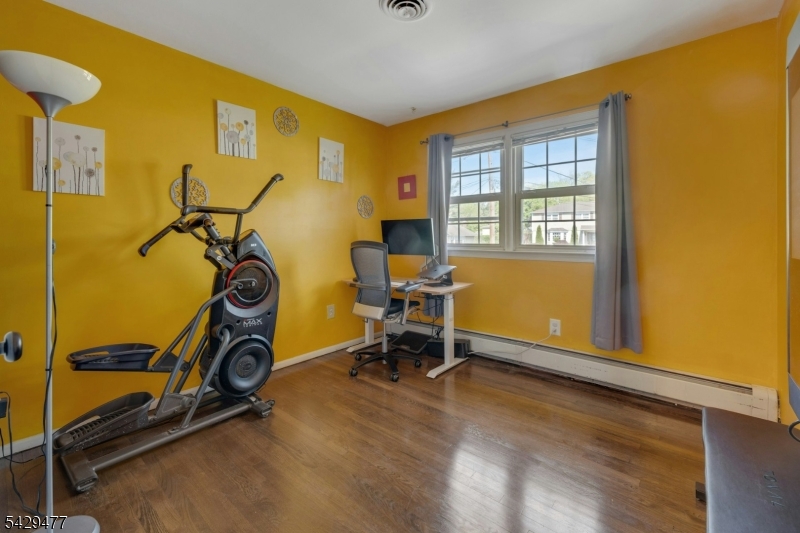 10 Ronald Terrace Springfield, NJ 07081 - Photo 19 of 36 a view of a room with gym equipment