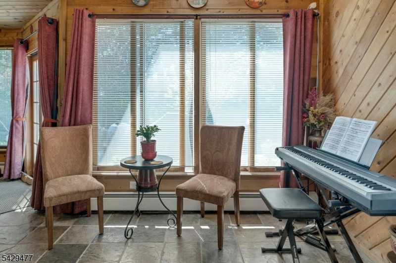 10 Ronald Terrace Springfield, NJ 07081 - Photo 23 of 36 a view of a livingroom with furniture and a window