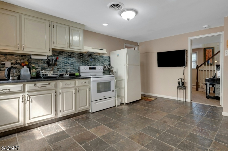 10 Ronald Terrace Springfield, NJ 07081 - Photo 25 of 36 a view of a kitchen with electric appliances