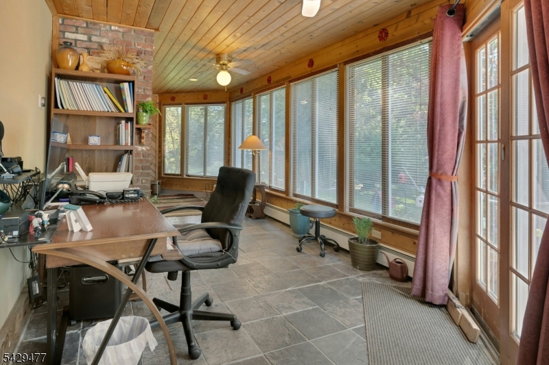 10 Ronald Terrace Springfield, NJ 07081 - Photo 26 of 36 a view of a livingroom with workspace and a window