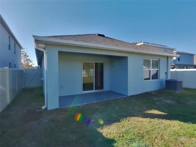 a view of backyard of a house
