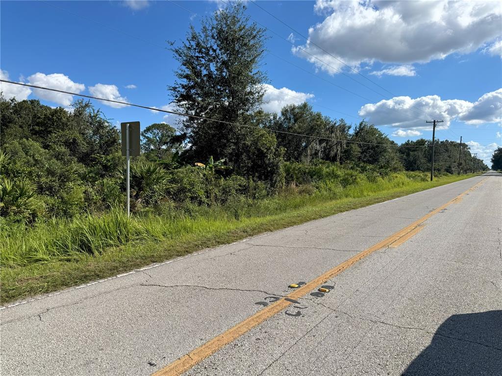 0 Alturas Babson Park Cut-Off Road Lake Wales, FL 33859 - Photo 2 of 22 a view of a street both of side of a building