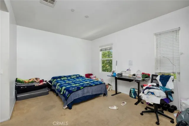 a bathroom with a shower curtain sink and a mirror
