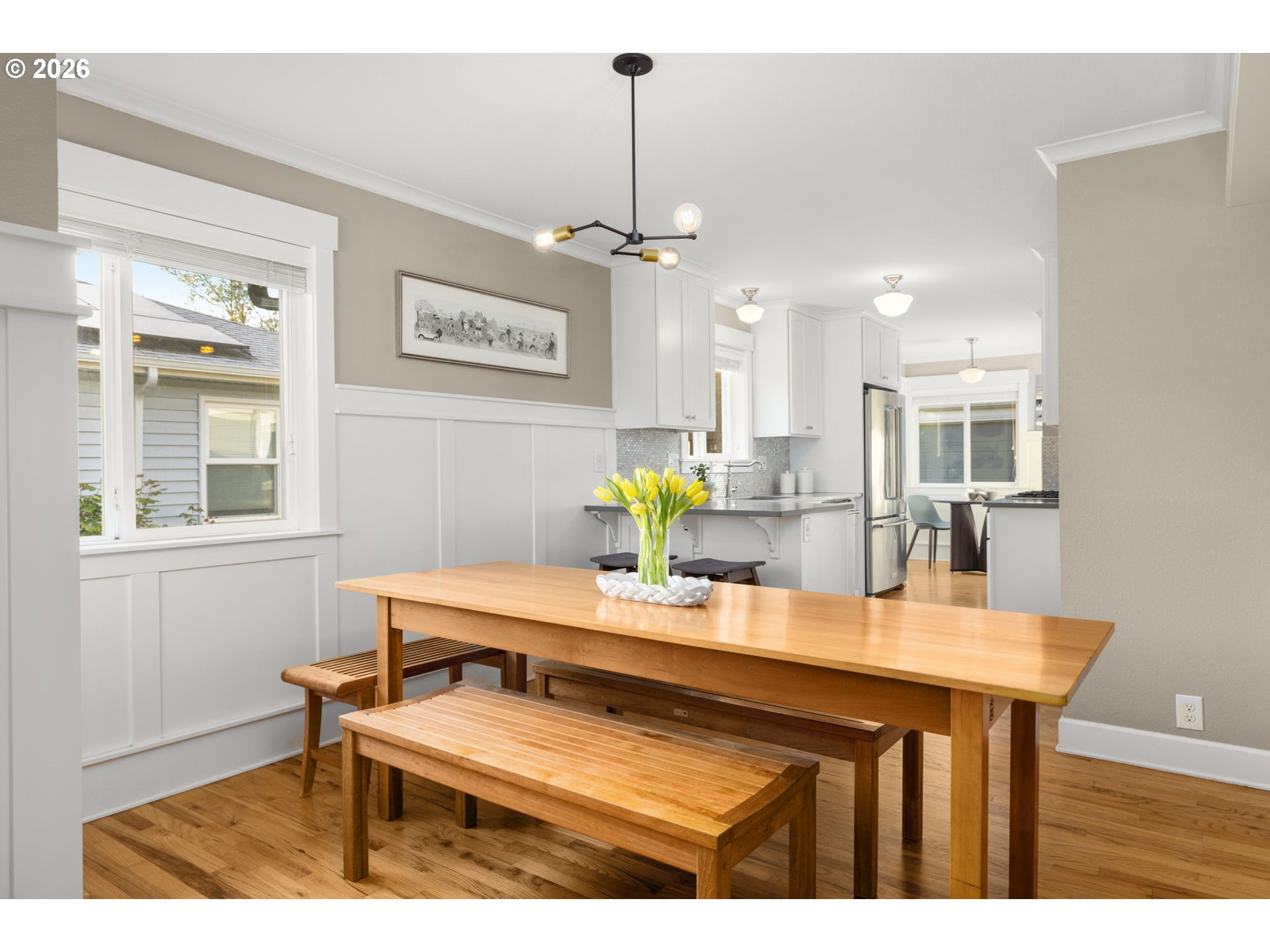 4117 Southeast Henderson Street Portland, OR 97202 - Photo 11 of 43 a dining room with a table chairs and couches