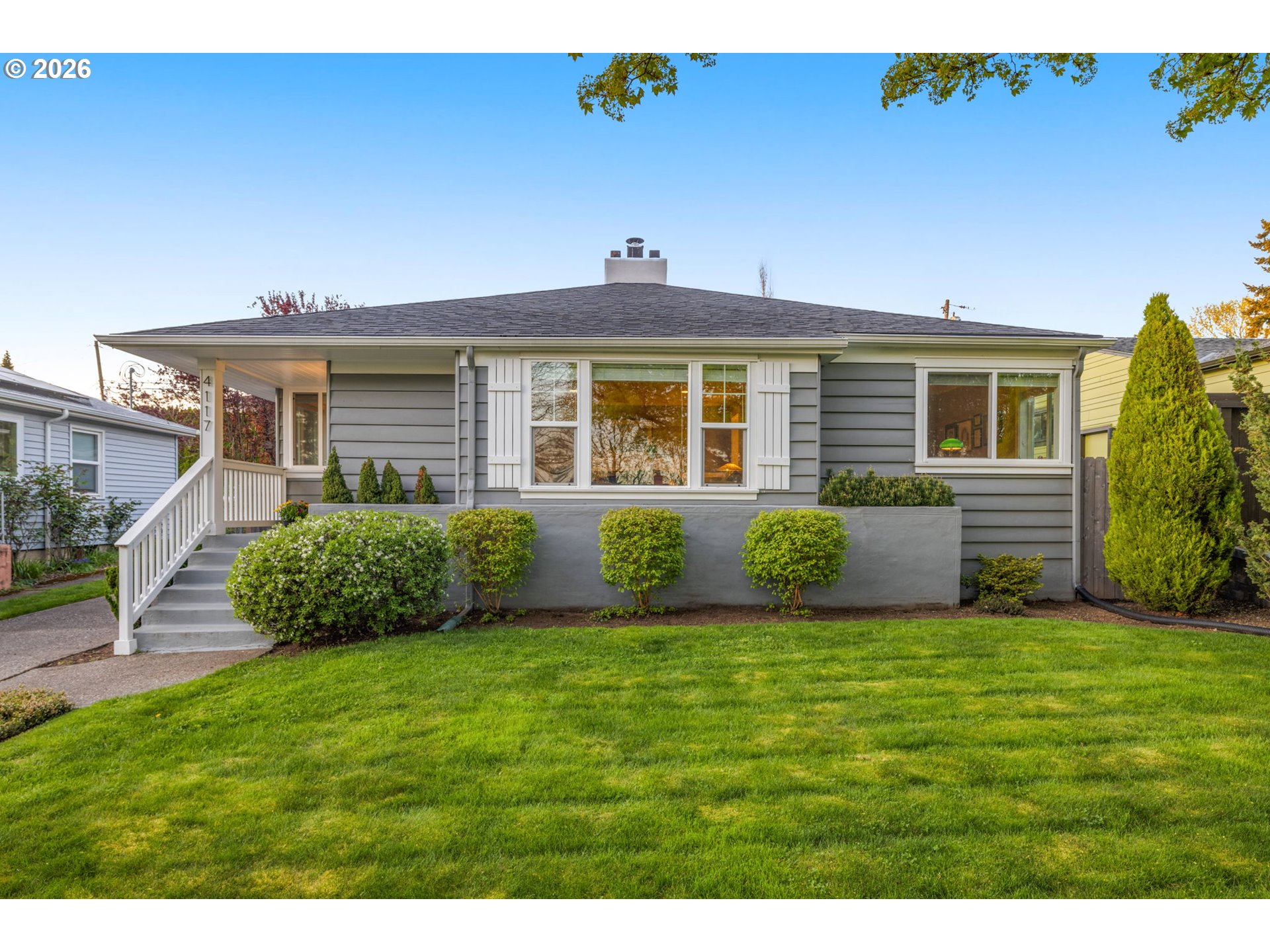 4117 Southeast Henderson Street Portland, OR 97202 - Photo 2 of 43 a view of a house with a yard