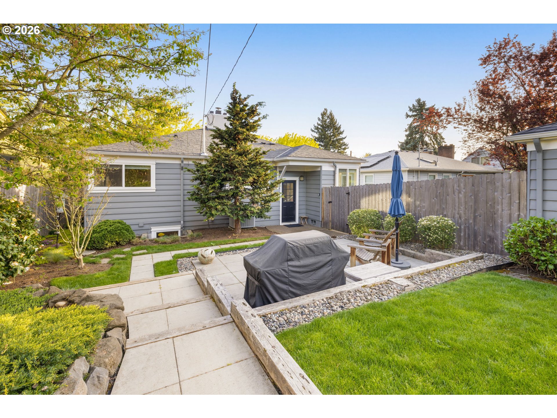 4117 Southeast Henderson Street Portland, OR 97202 - Photo 33 of 43 a view of a house with backyard and sitting area