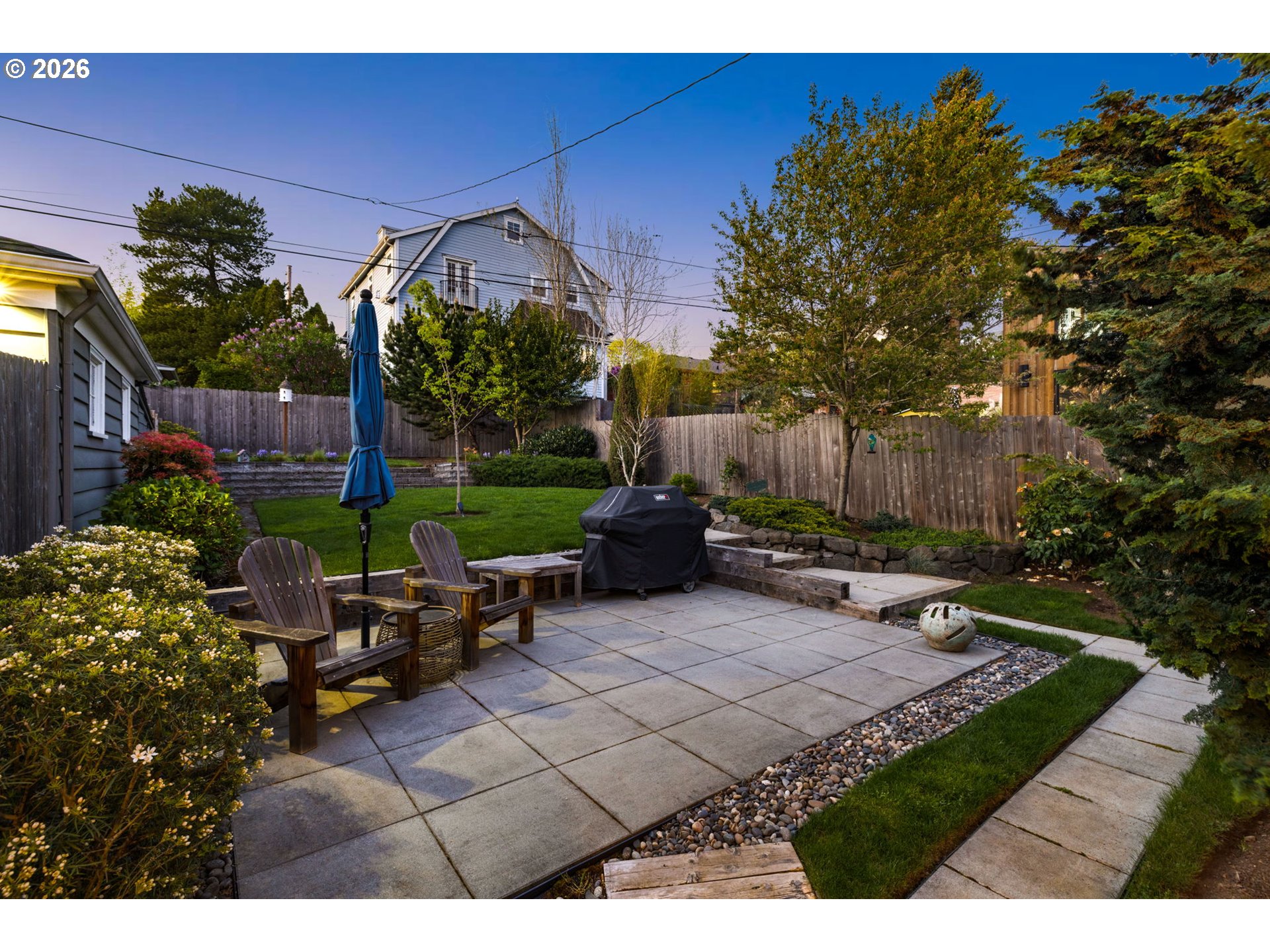 4117 Southeast Henderson Street Portland, OR 97202 - Photo 39 of 43 a view of a backyard with plants and a patio