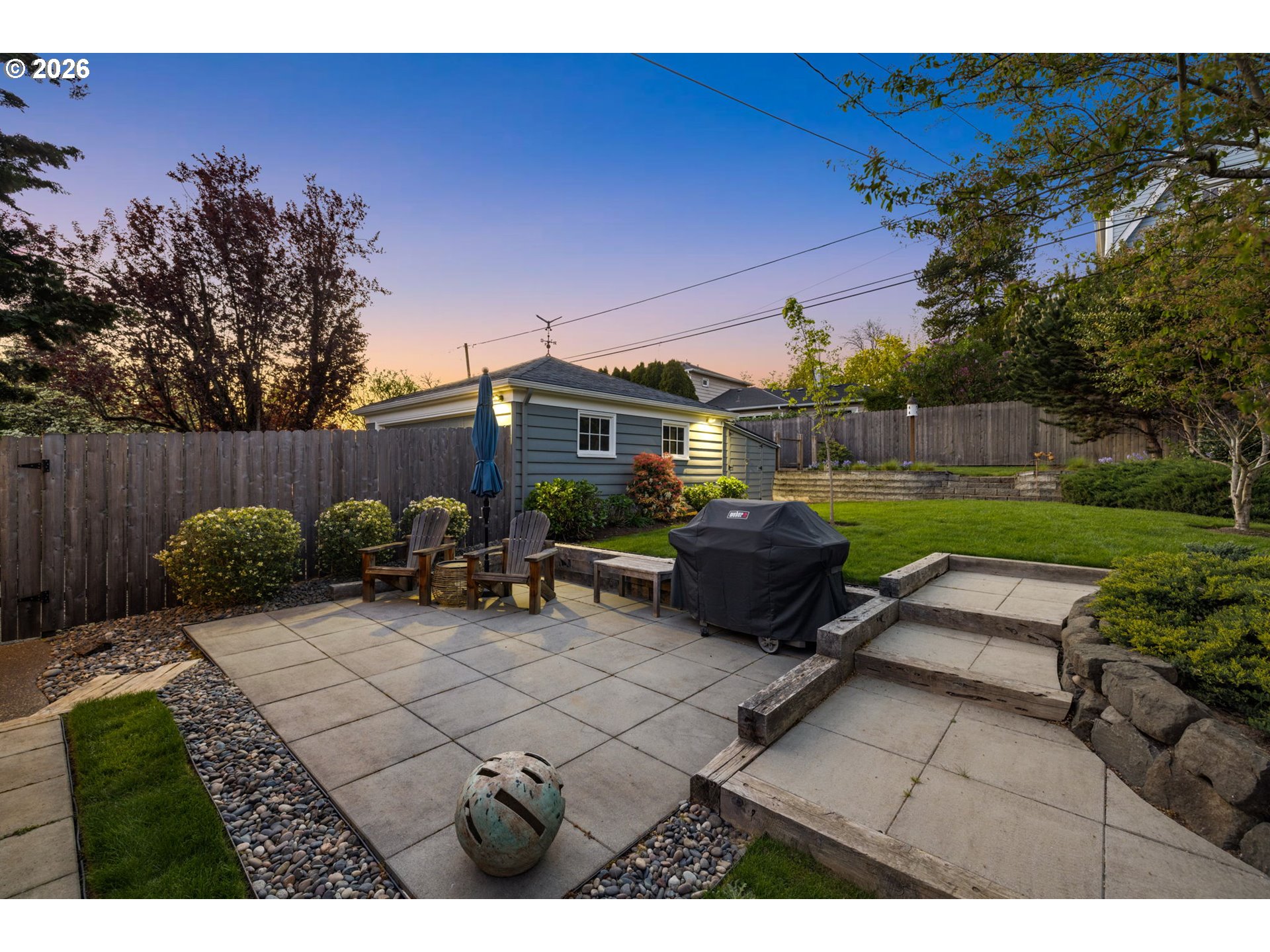 4117 Southeast Henderson Street Portland, OR 97202 - Photo 40 of 43 a view of a backyard with couches plants and large tree