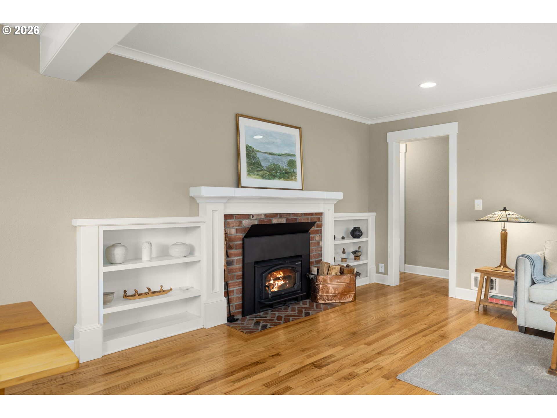 4117 Southeast Henderson Street Portland, OR 97202 - Photo 10 of 43 a living room with a fireplace