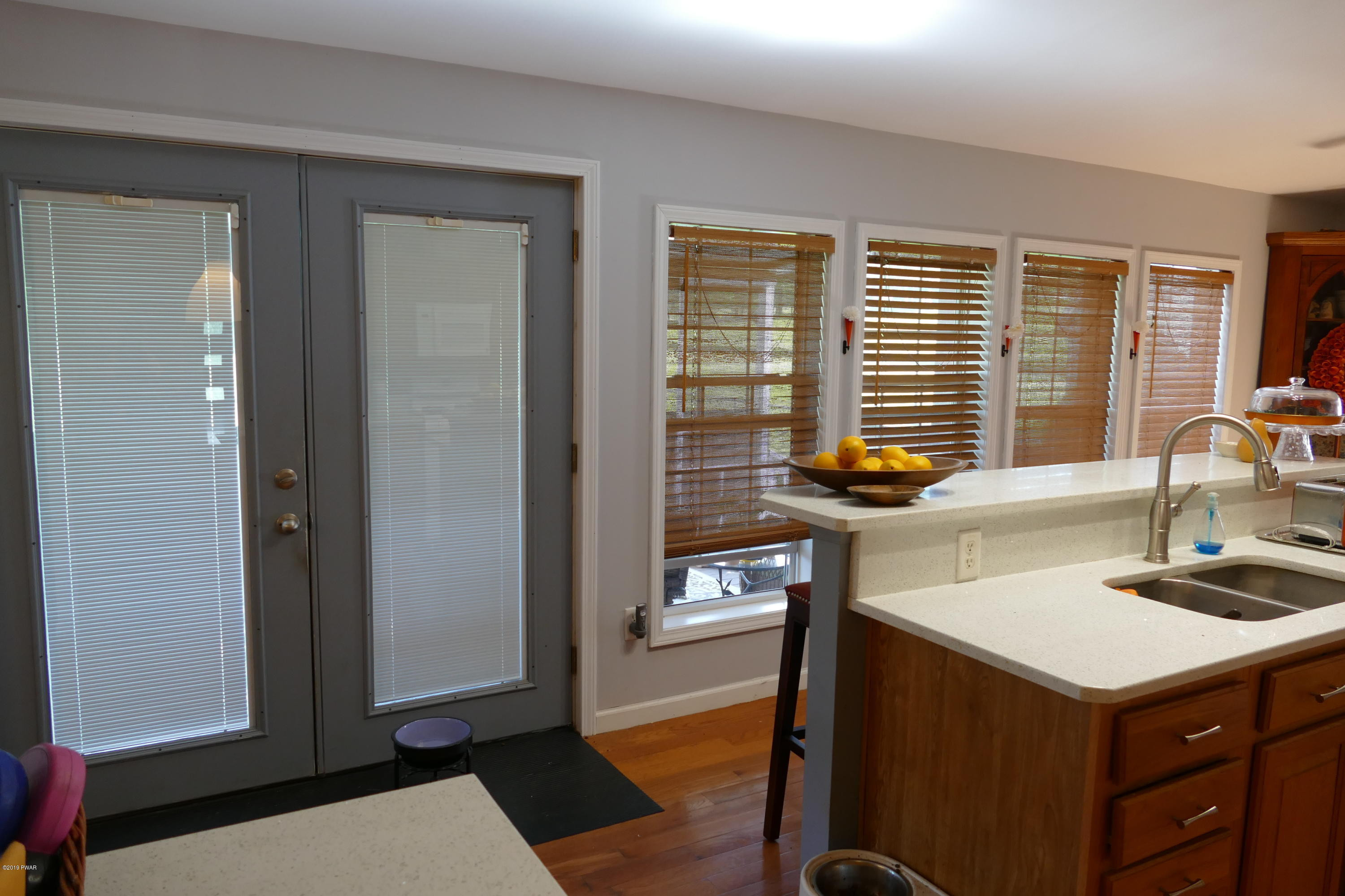 108 Savitz Road Moscow, PA 18444 - Photo 27 of 46 a kitchen with a sink cabinets and wooden floor