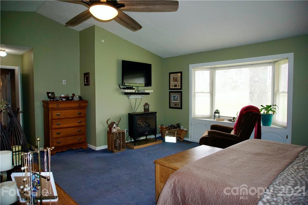 3038 Dravo Road Shelby, NC 28152 - Photo 17 of 33 a bedroom with a bed and furniture