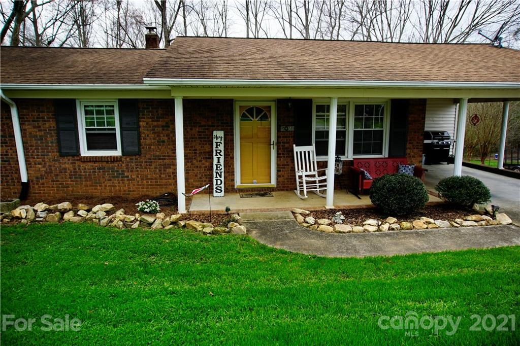 3038 Dravo Road Shelby, NC 28152 - Photo 3 of 33 a front view of a house with garden