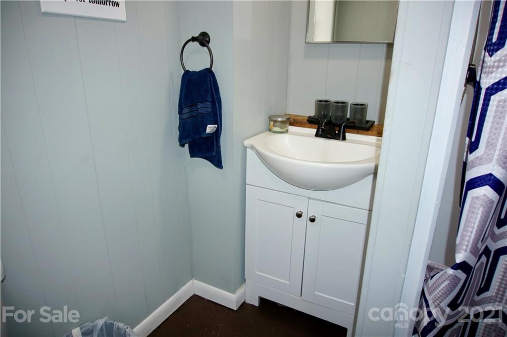 3038 Dravo Road Shelby, NC 28152 - Photo 24 of 33 a bathroom with a sink and mirror
