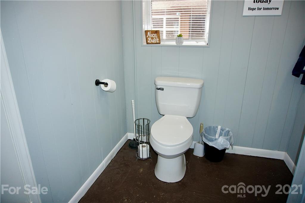 3038 Dravo Road Shelby, NC 28152 - Photo 25 of 33 a white toilet sitting next to a window