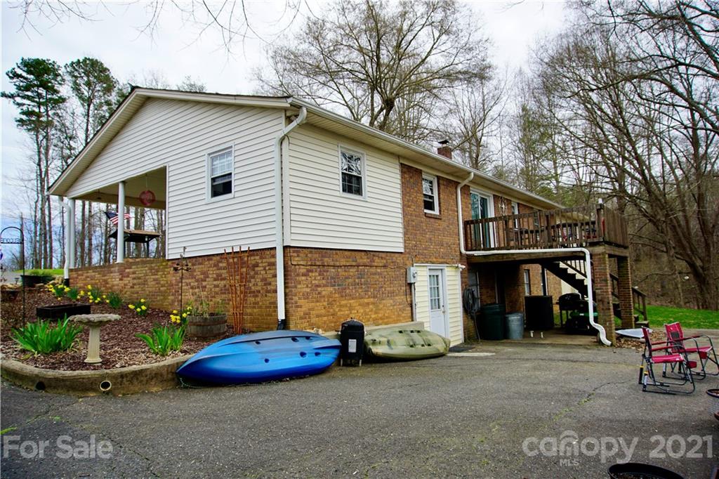 3038 Dravo Road Shelby, NC 28152 - Photo 28 of 33 a view of a house with a yard and plants