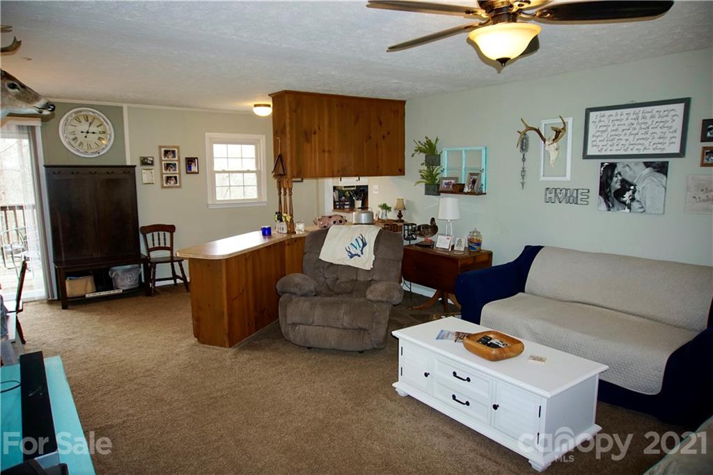 3038 Dravo Road Shelby, NC 28152 - Photo 4 of 33 a living room with furniture and a flat screen tv