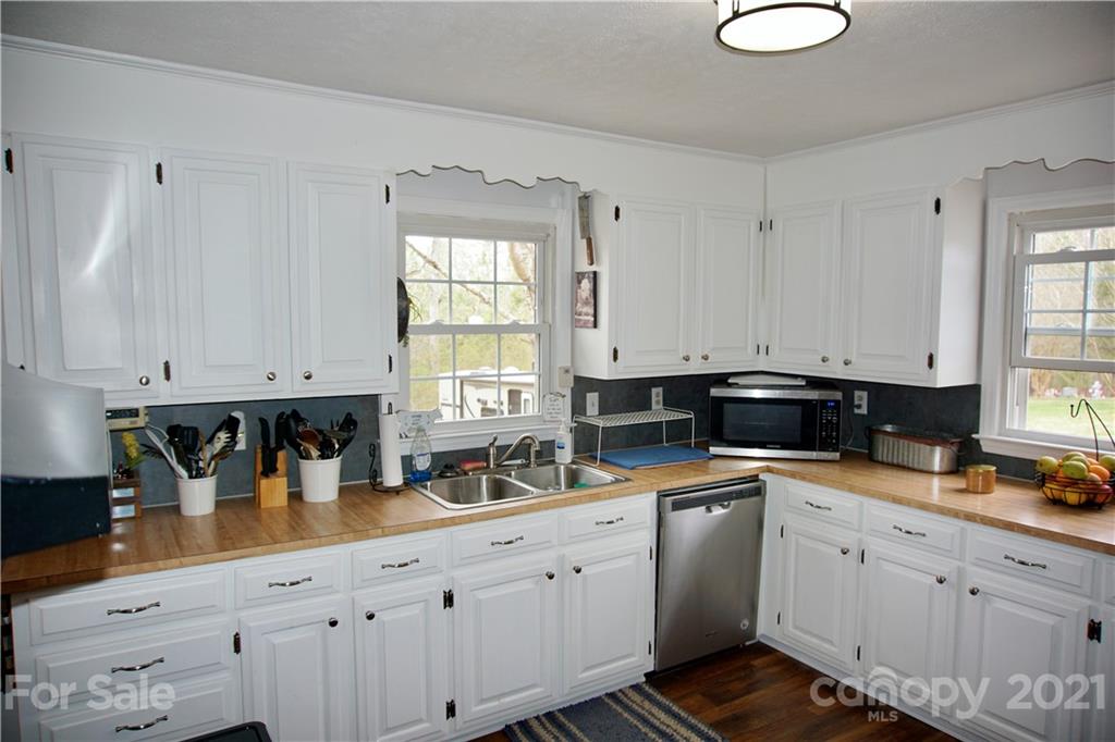 3038 Dravo Road Shelby, NC 28152 - Photo 8 of 33 a kitchen with cabinets appliances and a window