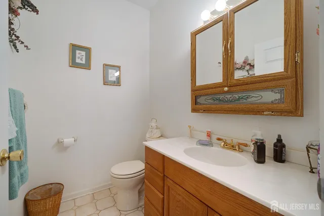 a bedroom with furniture and a gym equipment