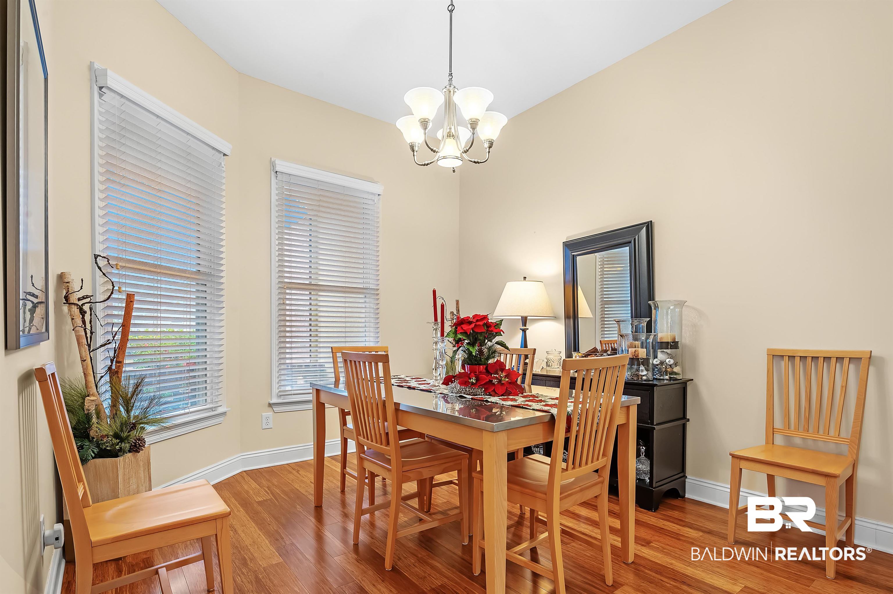 22726 Inverness Way Foley, AL 36535 - Photo 20 of 51 Dining area featuring a chandelier and wood-type flooring