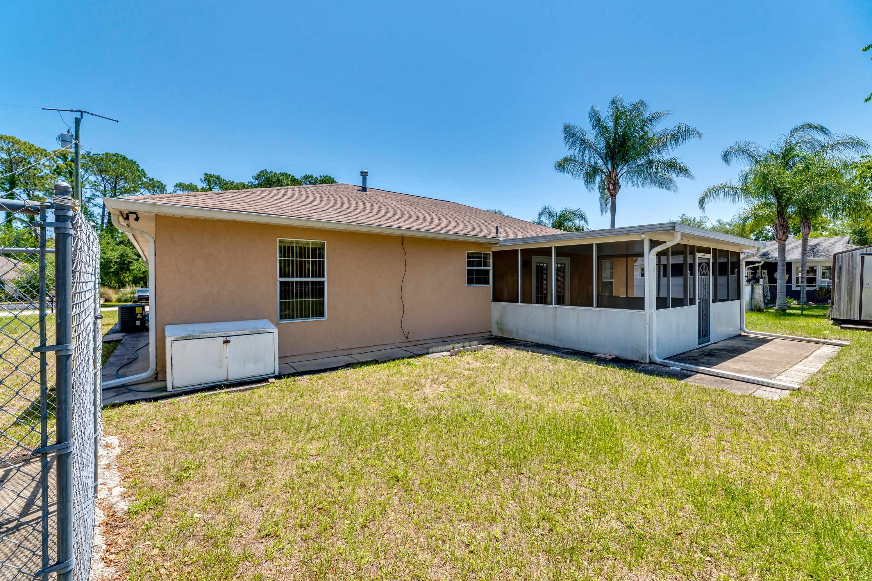 112 Gentian Road St. Augustine, FL 32086 - Photo 13 of 33 a view of a house with a swimming pool