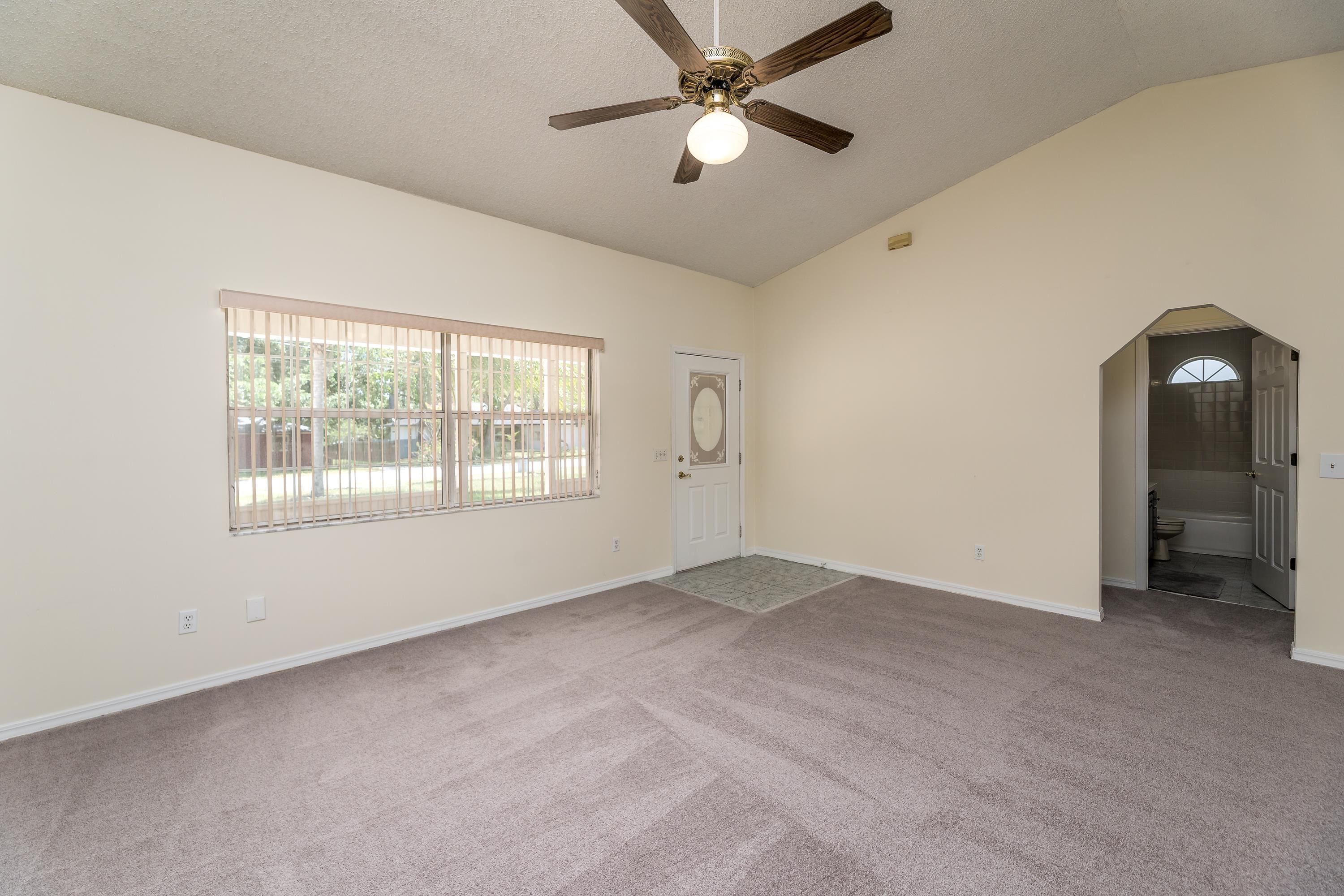 112 Gentian Road St. Augustine, FL 32086 - Photo 16 of 33 a view of an empty room with a window