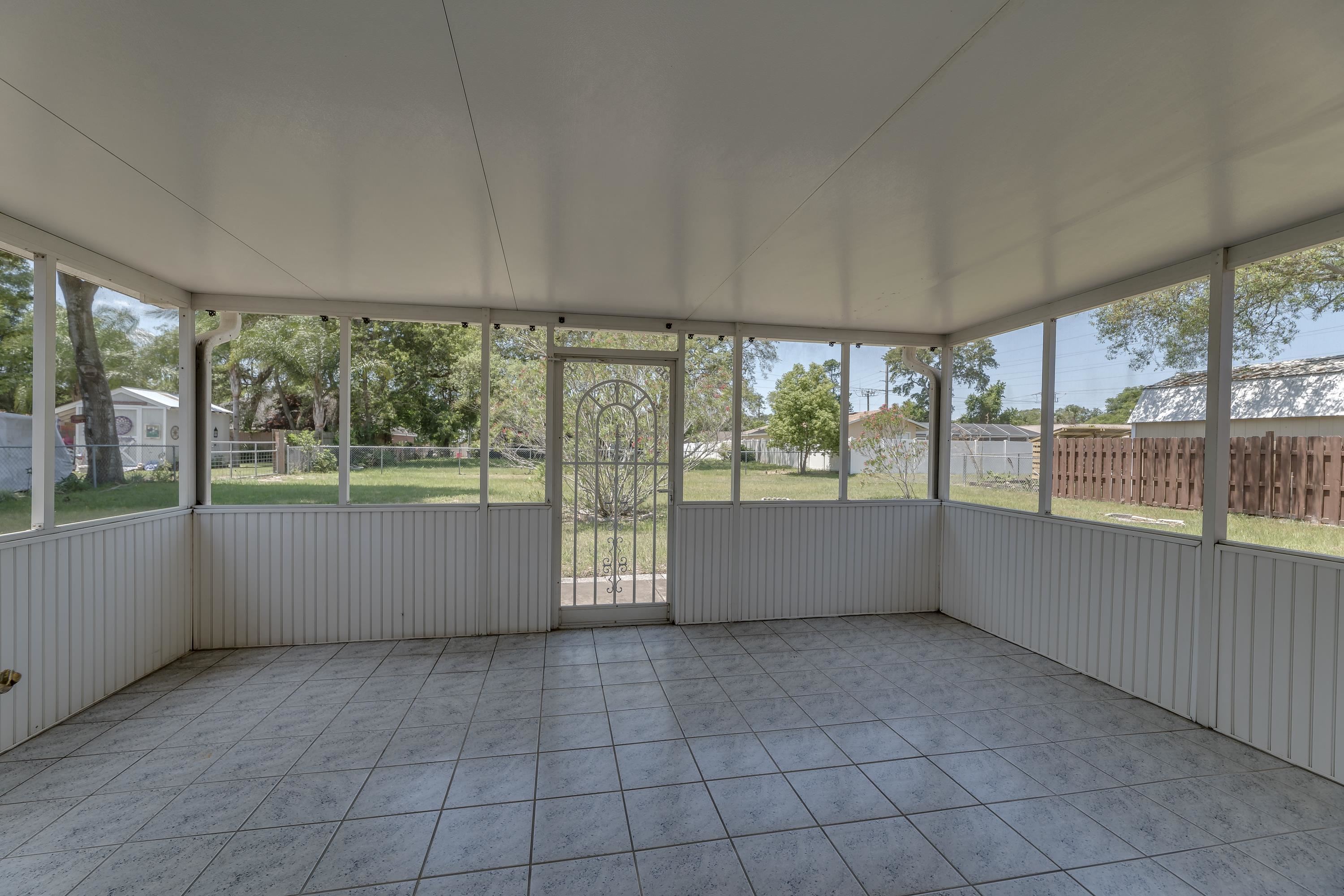 112 Gentian Road St. Augustine, FL 32086 - Photo 33 of 33 an empty room with large windows