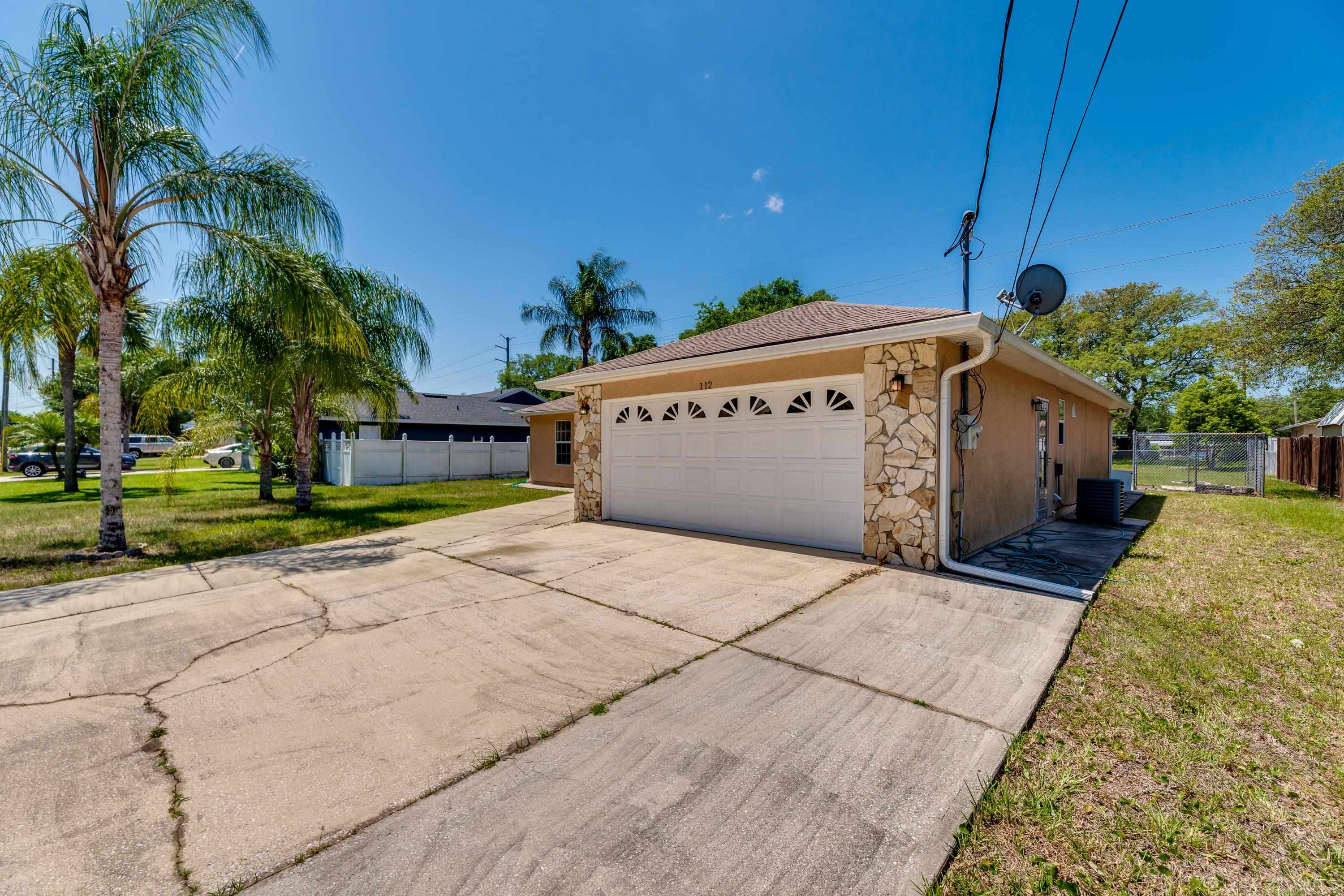 112 Gentian Road St. Augustine, FL 32086 - Photo 6 of 33 a view of a street with a building in the background