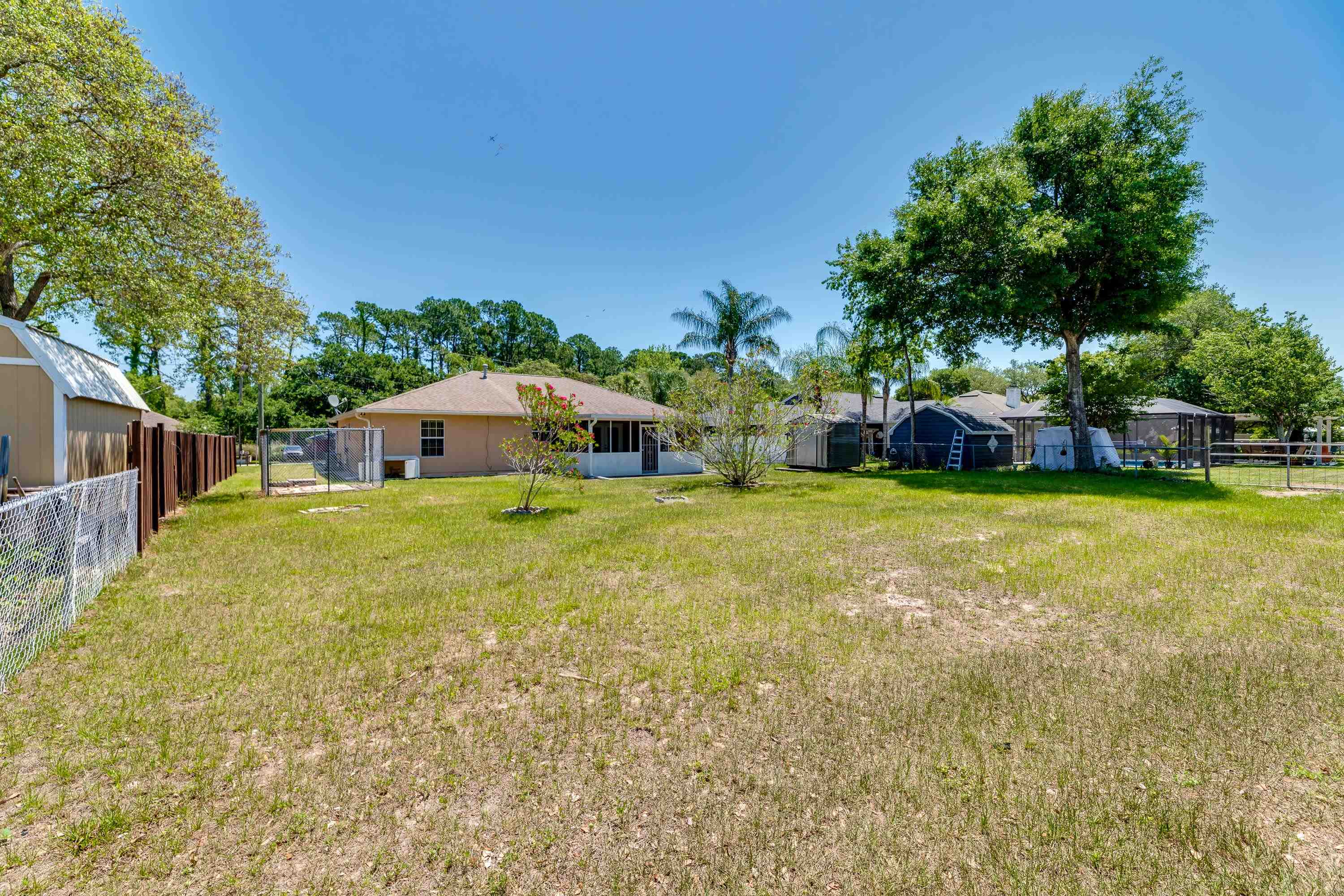 112 Gentian Road St. Augustine, FL 32086 - Photo 8 of 33 a view of a house with a yard