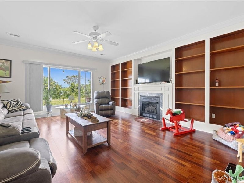 225 Lighthouse Pointe Hopewell, VA 23860 - Photo 20 of 32 a living room with furniture fireplace and a large window