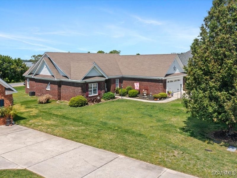 225 Lighthouse Pointe Hopewell, VA 23860 - Photo 27 of 32 a view of a house with a big yard plants and large trees