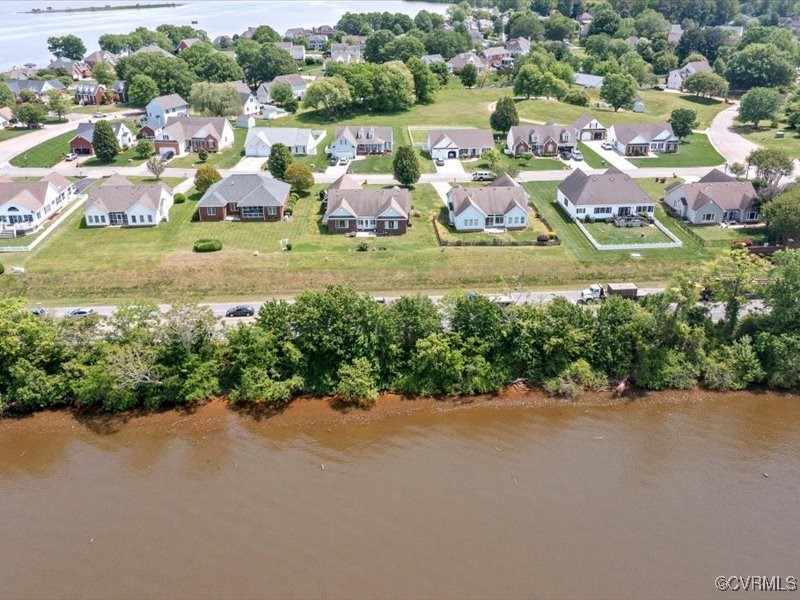 225 Lighthouse Pointe Hopewell, VA 23860 - Photo 31 of 32 a view of a lake with a city