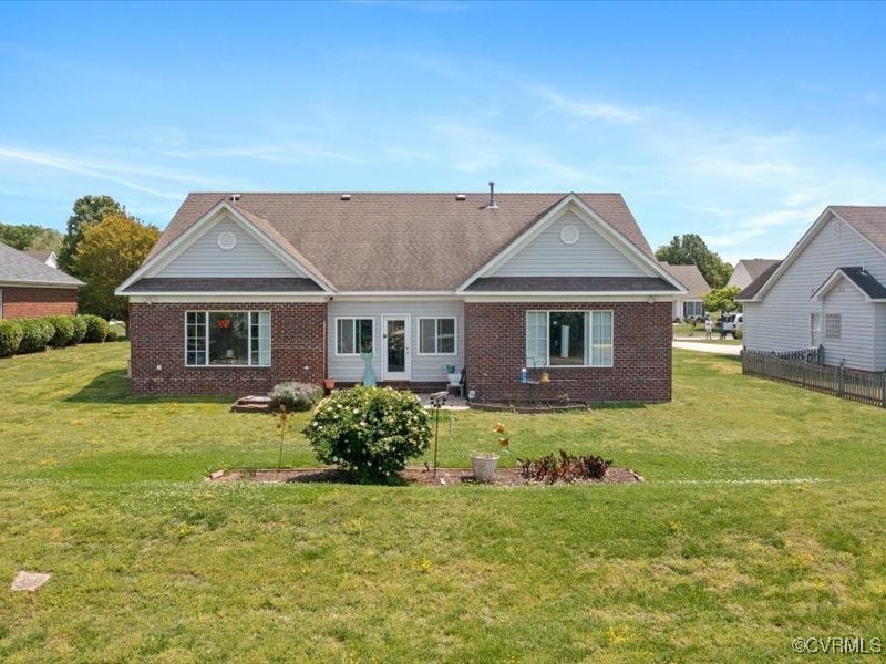 225 Lighthouse Pointe Hopewell, VA 23860 - Photo 32 of 32 a front view of a house with garden