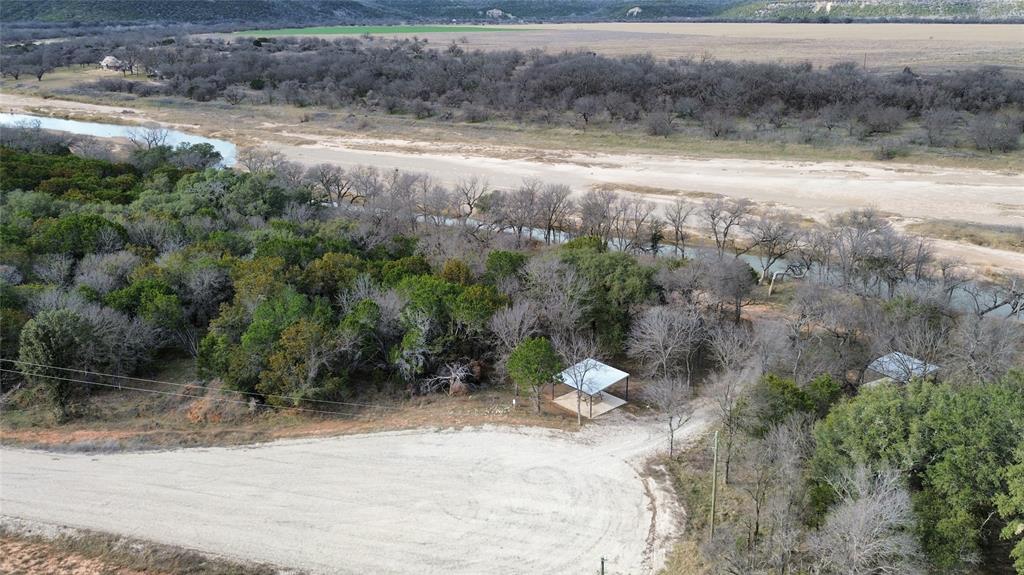 Lot 135 River Canyon Road Palo Pinto, TX 76484 - Photo 12 of 17 a view of a yard with a fountain